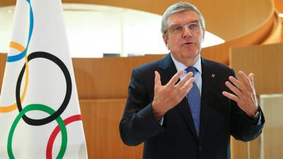 Есихидэ Суг - Томас Бах - Юрико Коикэ - Организаторы Олимпиады планируют провести прием в честь главы МОК - vesti.ru - Токио - Япония