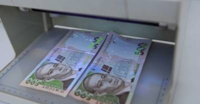 Курс валют: Чому гривня не поспішає падати до обіцяного Мінфіном курсу 28 грн/долар - delo.ua - США - Украина