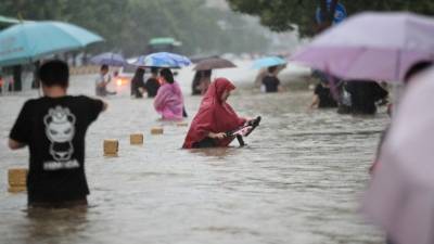 Наводнение в китайской провинции Хэнань разрушило плотину водохранилища - 5-tv.ru - Китай - Чжэнчжоу