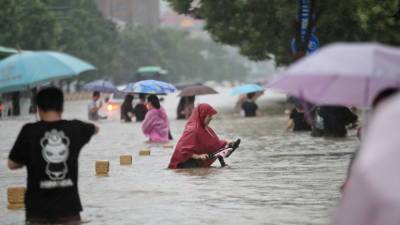 Чжао Лицзянь - Россияне не пострадали при наводнении в Китае - russian.rt.com - Россия - Китай - Чжэнчжоу