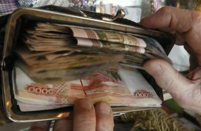 Доля просрочки по кредитам упала до уровня до пандемии - smartmoney.one - Россия - Reuters