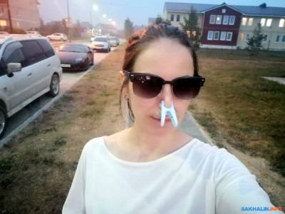 Валерий Лимаренко - Сахалинка с прищепкой на носу выступает против вони из коровников "Грин Агро" - sakhalin.info