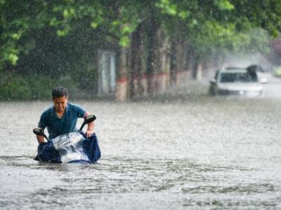 Чжао Лицзянь - Число жертв разрушительного наводнения в Китае возросло до 25 человек - unn.com.ua - Китай - Украина - Киев - Чжэнчжоу