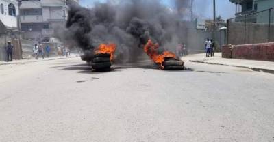 Моиз Жовенель - На Гаити протестующие устроили беспорядки во время прощания с убитым президентом Моизом - reendex.ru - Гаити