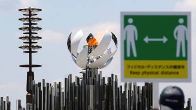 Копию чаши с олимпийским огнём установили на мосту в Токио - russian.rt.com - Токио
