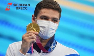 Евгений Рылов - Давид Белявский - Российскому пловцу запретили выйти на награждение в маске кота - fedpress.ru - Россия - Токио