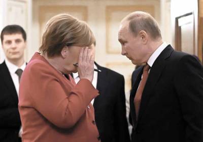 Владимир Путин - Ангела Меркель - Биограф канцлера сообщил, что из-за Украины Меркель и Путин говорили на повышенных тонах - news-front.info - Россия - Украина - Германия