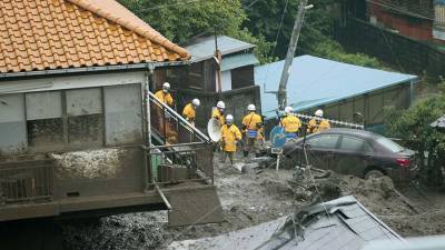Два человека погибли и 20 пропали без вести на месте оползня в Японии - iz.ru - Токио - Израиль - Япония - Атами
