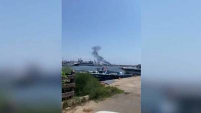Два человека пострадали из-за пожара на судне в порту Латакии - iz.ru - Норвегия - Израиль - Сирия - Сана - Латакия - Латакия
