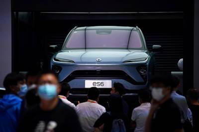 Китайский конкурент Tesla сократил убытки - lenta.ru - Китай