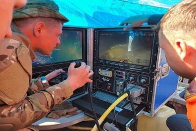 Показаны первые кадры обломков упавшего в Курильское озеро Ми-8 - lenta.ru - Камчатский край