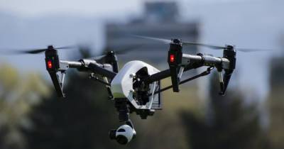 Летающий робокоп: дрон с тепловизором засек грабителей банка, прятавшихся от полиции на крыше (видео) - focus.ua - Украина - Англия - Santander - Великобритания