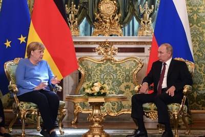 Владимир Путин - Ангела Меркель - Путин предупредил Меркель о планах Украины отказаться от Минских соглашений - lenta.ru - Москва - Россия - Украина - Киев - Германия