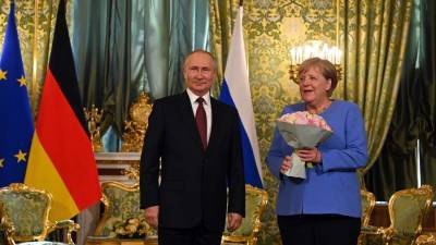 Владимир Путин - Ангела Меркель - В Китае сделали выводы о характере Путина по подаренному Меркель букету - iz.ru - Москва - Россия - Китай - Израиль - Германия