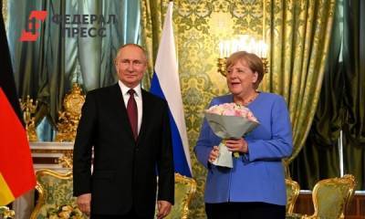 Владимир Путин - Ангела Меркель - Карин Кнайсль - Иностранные журналисты гадают, что кроется за букетом Путина Меркель - fedpress.ru - Москва - Австрия - Россия - Германия - Франция