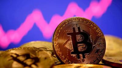 Впервые за три месяца: курс биткоина превысил $50 тысяч - russian.rt.com - Китай - США - Англия