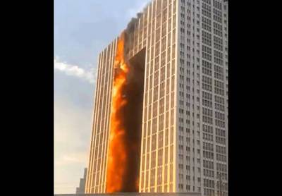 В китайском городе Далянь вспыхнул жилой небоскреб (видео) - vchaspik.ua - Китай - Украина - Далянь