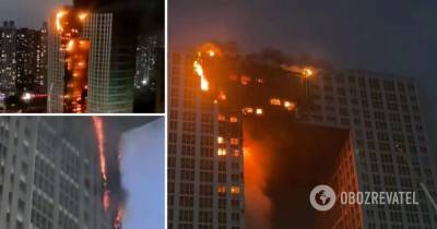 Далянь - пожар в небоскребе: подробности, фото и видео - obozrevatel.com - Китай - Далянь