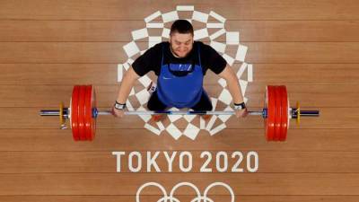 Муса Евлоев - Тяжелоатлет Наниев стал четвертым на ОИ в весовой категории до 109 кг - iz.ru - Россия - Китай - Токио - Израиль - Япония