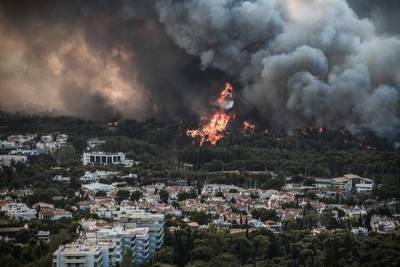Никос Хардалиас - Более 300 человек спасли от пожара в пригороде Афин - runews24.ru - Греция