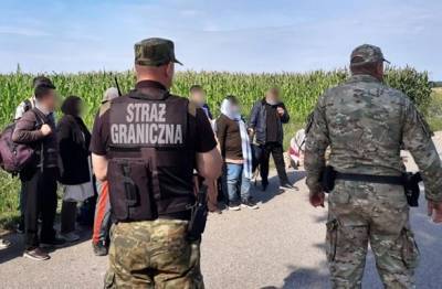 На польско-белорусской границе задержали крупнейшую в истории группу иммигрантов - unn.com.ua - Украина - Киев - Белоруссия - Ирак - Польша - Литва