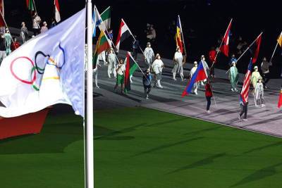 Абдулрашид Садулаев - Садулаев вынес флаг ОКР на церемонии закрытия летней Олимпиады в Токио. ФОТО - sport.ru - Россия - США - Токио - Другие