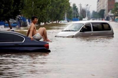 Китай накрыло мощное наводнение: людей эвакуируют тысячами (ВИДЕО) - enovosty.com - Китай
