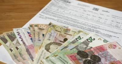 Долги украинцев за коммуналку в июле сократились на 3% - delo.ua - Украина