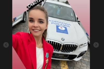 Владимир Путин - Дина Аверина - Арин Аверин - Дина Аверина показала подаренный чемпионам Олимпиады автомобиль - mk.ru - Россия - Токио
