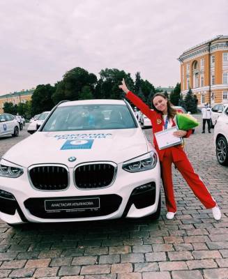 Дмитрий Медведев - Кузбасская гимнастка Анастасия Ильянкова показала подаренный ей автомобиль BMW X3 - gazeta.a42.ru - Москва - Россия - Токио