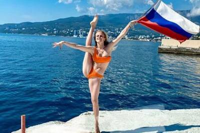 Выступавшая за Украину чемпионка ОИ показала фото из Крыма с флагом России - lenta.ru - Россия - Украина - Крым - Токио - Донецк