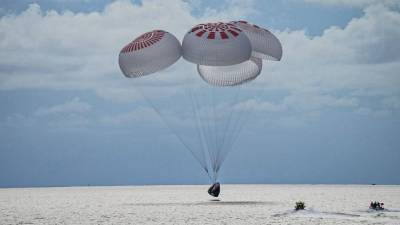 Джаред Айзекман - Crew Dragon с полностью гражданским экипажем приводнился в Атлантике - svoboda.org - шт.Флорида