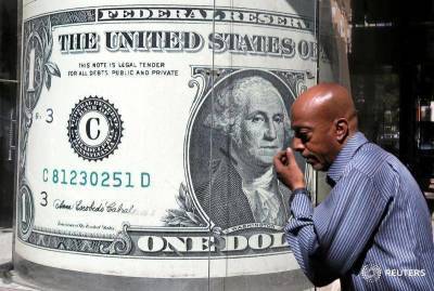 За первые пять минут торгов курс доллара США понизился до 72,6322 руб. - smartmoney.one - США - Reuters