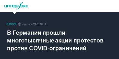 В Германии прошли многотысячные акции протестов против COVID-ограничений - interfax.ru - Москва - Германия
