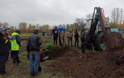 У Харківській області розпочалась ексгумація масового поховання військових (фото) - rbc.ua - Україна