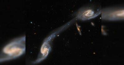 Сверхъестественная рука. Телескоп Хаббл показал удивительное соединение двух галактик (фото) - focus.ua - Украина