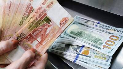 Банки начали продавать доллары по 100 рублей - iz.ru - Украина - Израиль