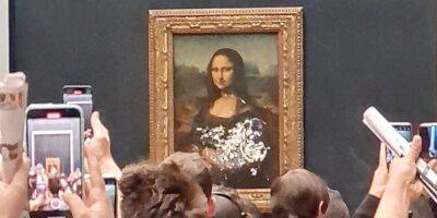 Мона Лиза - Леонардо Да-Винч - Странный активизм. В Лувре неизвестный мужчина бросил торт в Мону Лизу - nv.ua - Украина