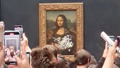 Мона Лиза - Леонардо Да-Винч - Нападение на Мону Лизу: «старушка» метнула в Джоконду тортом - fokus-vnimaniya.com