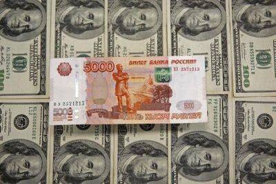 Тимур Алиев - Курс доллара упал ниже 66 рублей впервые с марта 2020 года - smartmoney.one - Reuters