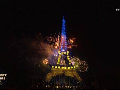 В Париже во время празднования Дня взятия Бастилии Эйфелеву башню подсветили цветами украинского флага - unn.com.ua - Украина - Киев - Франция - Париж