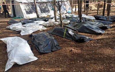 В Ізюмі знайшли вже більше 260 тіл катованих, в тому числі двох дітей (фото) - rbc.ua - Украина - Україна