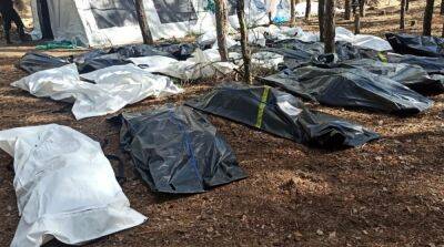 В Изюме на месте массового захоронения эксгумировали около 430 тел – полиция - ru.slovoidilo.ua - Украина - Киев - Изюм