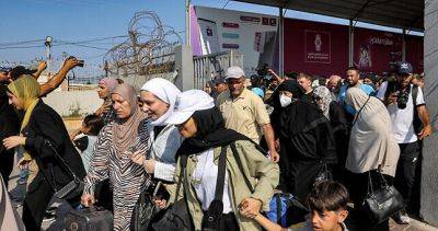 Джеймс Клеверли - Египет открыл КПП на границе с сектором Газа для эвакуации иностранцев - dialog.tj - Англия - Израиль - Египет - Палестина - Катар - Reuters