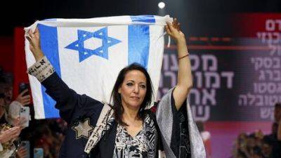 Яир Лапид - Рон Хульдаи - Жену Лапида изобразили с палестинским флагом: кто стоит за фейком - vesty.co.il - Израиль - Тель-Авив