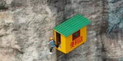 «Самый неудобный». В Китае на скале работает магазин для альпинистов — фото - nv.ua - Китай - Украина - Англия