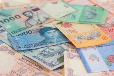 Азиатские валюты падают на фоне стабильного доллара - minfin.com.ua - Китай - США - Украина - Япония - Индия - Малайзия