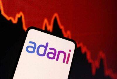 Капитализация группы Adani упала ниже $100 млн - smartmoney.one - США - Индия - Reuters