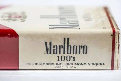 Табачный гигант Philip Morris признал, что может никогда не выйти из РФ - minfin.com.ua - Россия - США - Украина - Англия - Япония
