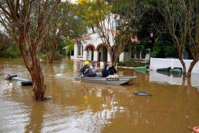 Сильный дождь вызвал внезапное наводнение в Сиднее - unn.com.ua - Украина - Киев - Австралия - Сидней - Reuters